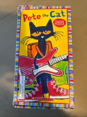 Scholastic Pete the Cat Puzzle with Yellow Background and Pink Guitar